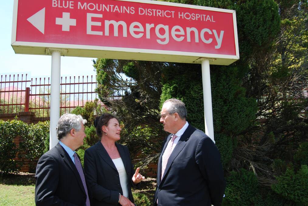 NSW MLC Adam Searle, Labor candidate for Blue Mountains Trish Doyle and NSW shadow health minister Walt Secord outside Katoomba Hospital.