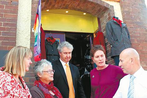 Adele Colman from Blackheath Chamber of Commerce, Raelene Allen, owner of Ravir, and ALP MLC Adam Searle, ALP candidate Trish Doyle and Opposition leader John Robertson outside Ms Allen's shop in Blackheath.