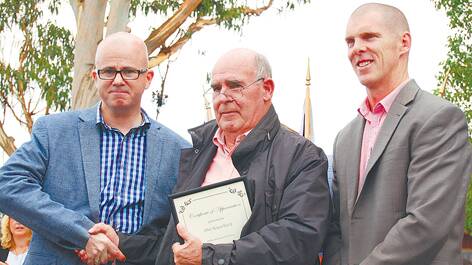 Phil Koperberg is presented with a Certificate of Appreciation at opening ceremony of Springwood Foundation Day by Blue Mountains mayor Mark Greenhill and deputy mayor Brendan Luchetti.