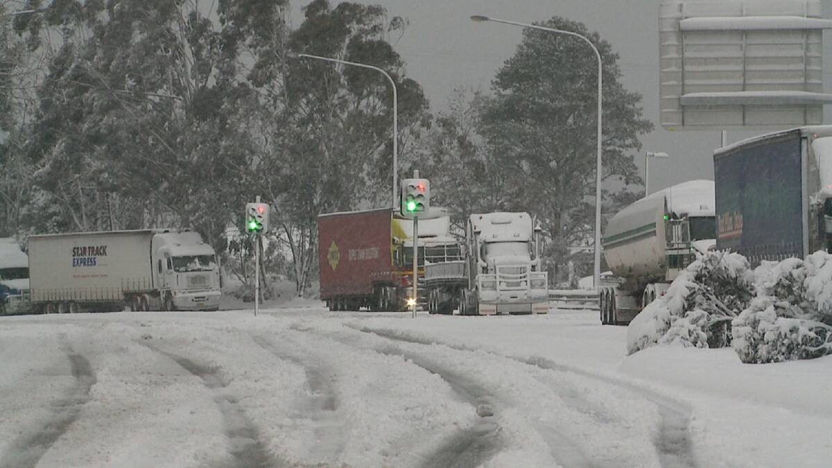 Stationary trucks on the Great Western Highway at Katoomba on Friday morning. Picture: Top Notch Video