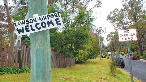 Sleepy Sayers Street has a new sign, with one wag announcing the opening of Lawson Airport via a hand-made sign after a small plane landed in a nearby neighbour's front yard.