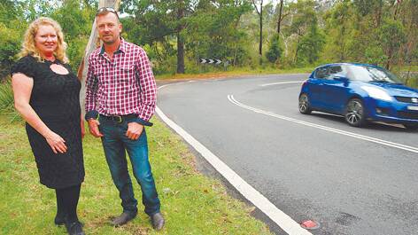 North Lawson resident Robyn Malone and Bullaburra resident Rob Bettington want council to conduct a major safety upgrade at the sharp bend where Lurnea and Hay Streets meet.