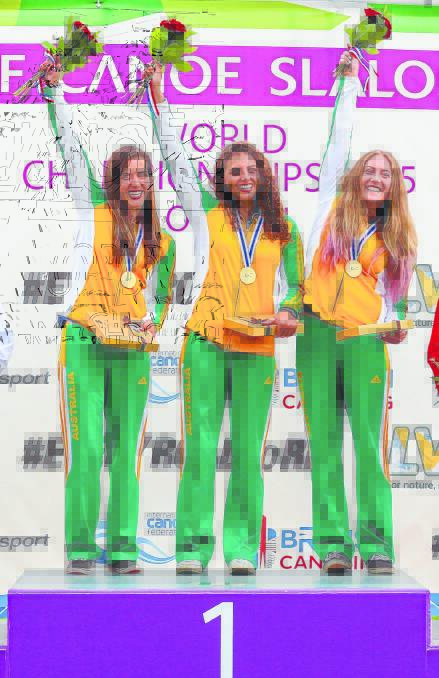 Ros Lawrence, Jessica Fox and Alison Borrows receive their gold medals for winning the women's C1 teams event at the 2015 Canoe Slalom World Championships in London on Sunday. Photo: Balint Vekassy.