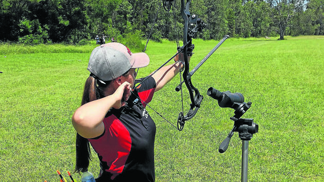 Winmalee's Rosie Walklate-Cooke shoots another bow at the recent field archery nationals tournament.