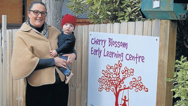 Unhappy at bus parking plans: Danielle Handspiker, owner of Cherry Blossom Early Learning Centre, with her son, Wilbur.