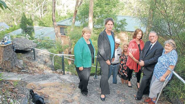 From left, NSW Upper House MP Helen Westwood, Blue Mountains Labor candidate Trish Doyle, supporters Alec Gardiner, Kim Cowper, Angelique Henson, NSW finance and services spokesman Peter Primrose and Pamela Gardiner at Ms Cowper's Valley Heights home in bushland last week.