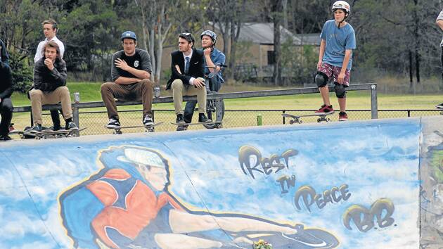 Fellow ex-Blaxland High student, Glenbrook artist and design student, Sam Linas, painted the mural of Jarrod Samson-Hills, whose nickname was "BB" to his skate mates, at Glenbrook Skate Park. Crowds gathered at the skate park last Friday to celebrate the life of their friend. Photo: B.C Lewis.