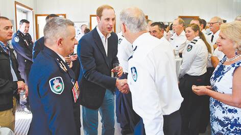 Prince William, Duke of Cambridge, meets first responders involved in the October 2013 Blue Mountains bushfires. Photo: Wolter Peeters/Fairfax Media.