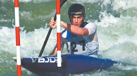 Seventeen-year-old St Columba's high school student Lachlan Croft paddles his way into semi-final contention in the junior men's K1 heats at the ICF Canoe Slalom Junior/U23 World Championships held at Penrith Whitewater Stadium last week. Photo: Geoff Jones
