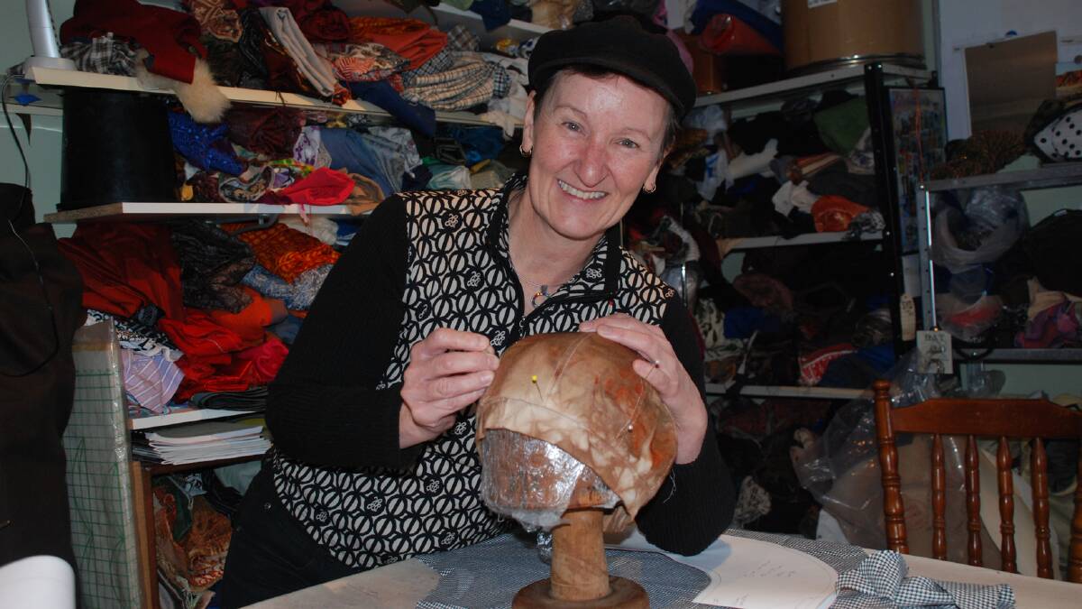 Christine Thompson in her tiny home studio in Woodford where she creates her stunning hats.