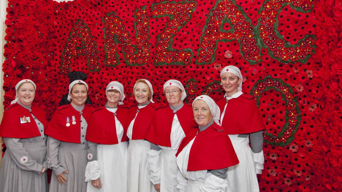 Blue Mountains Hospital nurses wore wartime nursing uniforms at the unveiling of the poppies.