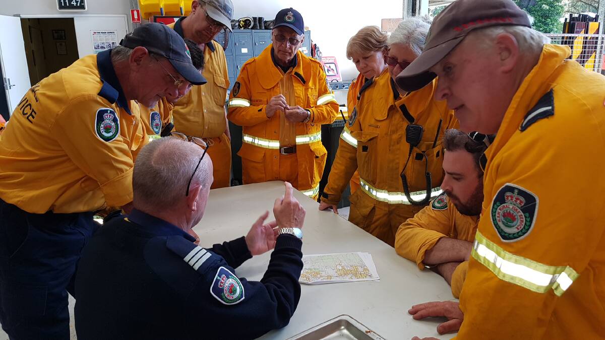 Planning the search: Emergency services at the command post in Woodford on Monday for missing man Peter Markham. Photo: Top Notch Video