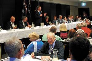 Hearing public’s concerns: NSW Premier Barry O’Farrell addresses the community cabinet meeting in Springwood on Monday night.