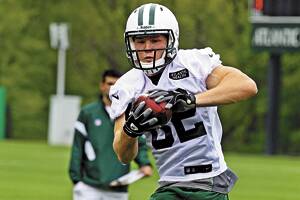 Coming to grips: Hayden Smith gets put through his paces at the New York Jets.