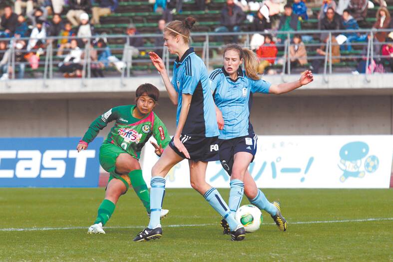 Sydney FC defender Alesha Clifford (centre), from Winmalee, towers over a defender in a Women's Club Championship quarter-final clash against NTV Beleza in Akayama, Japan on November 30. Photo: Sydney FC
