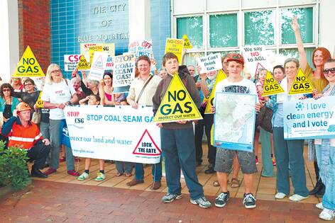 CSG protestors, including Clr Geordie Williamson (centre) before last week’s council meeting.