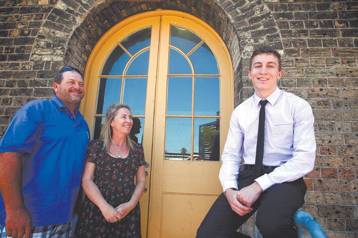 HSC student Josh Murray of Glenbrook topped the state in his Electrotechnology exam. He is pictured with proud parents Michael and Lisa. Photo: Danielle Smith