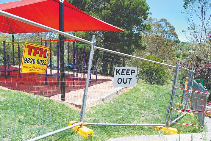 Fencing around the backyard of the Katoomba Neighbourhood Centre where asbestos has been found.