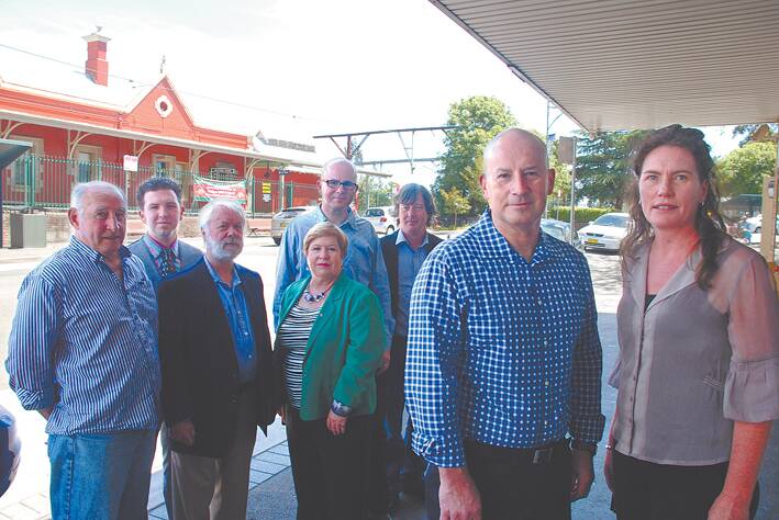 NSW opposition leader John Robertson and Labor’s Blue Mountains spokeswoman Trish Doyle outside Springwood Railway Station on Sunday with (from left) Labor councillor Don McGregor, Hotel Blue manager Chris Cannell, councillor Mick Fell, Upper House MP Helen Westwood, Blue Mountains mayor Mark Greenhill and David Holmes.