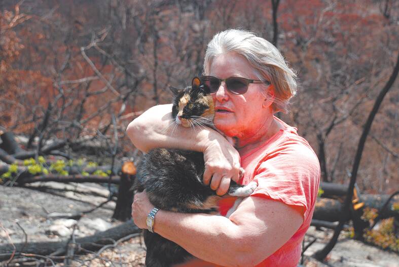 Bev Hamilton and Lily who survived 40 days in the bush in Yellow Rock and was found on Monday.