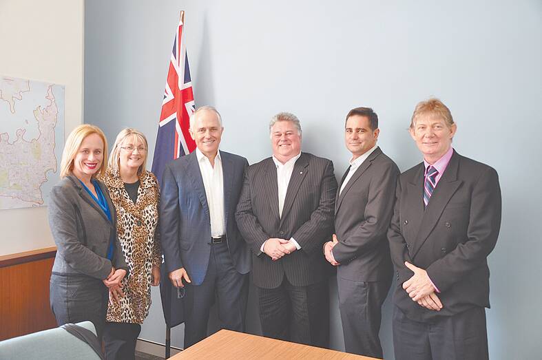Blue Mountains Economic Enterprise CEO Jacqueline Brinkman, Macquarie MP Louise Markus, Communications Minister Malcolm Turnbull, BMEE chairman Donald Luscombe, and the Blue Mountains Connected Communities Group’s Noel Burgess and Hereward Dundas-Taylor.