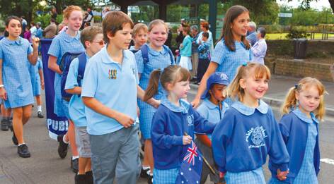 One of the many retrieved photos with Harry Fuller walking in Springwood with other Winmalee Public School students on Anzac Day, 2006. 