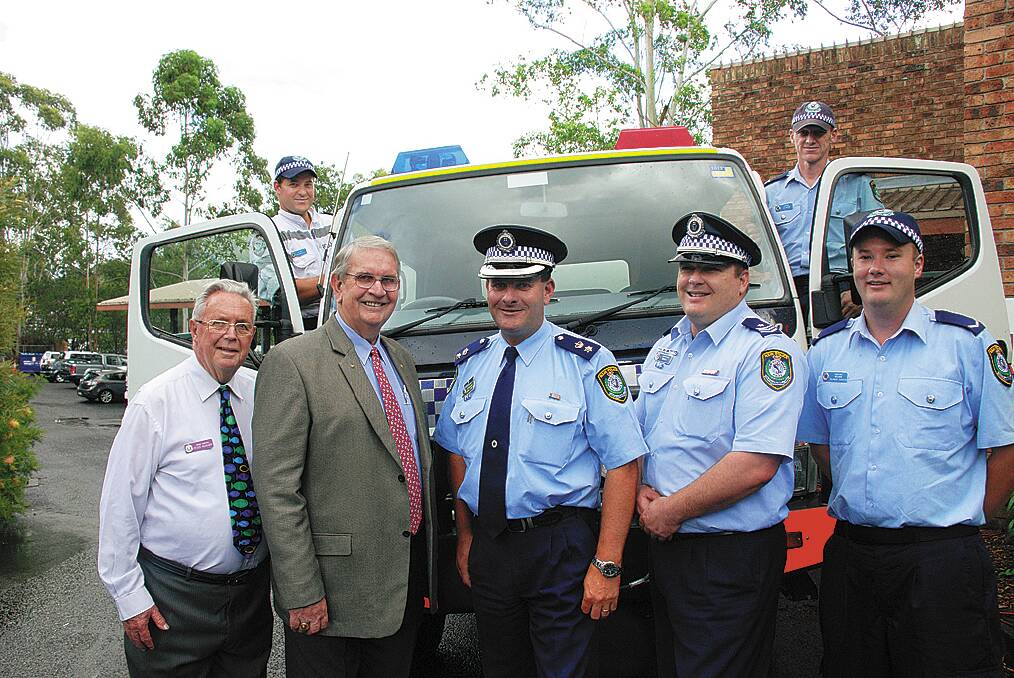 Front, from left, Police chaplain Peter Kilkeary with Rotary's John Wakefield, Superintendent Darryl Jobson, Sergeant Michael Magill and Constable Damien Mitchell with (back) rescue operator Andrew Gott and Constable Martin Dixon pictured in front of Rescue 82.