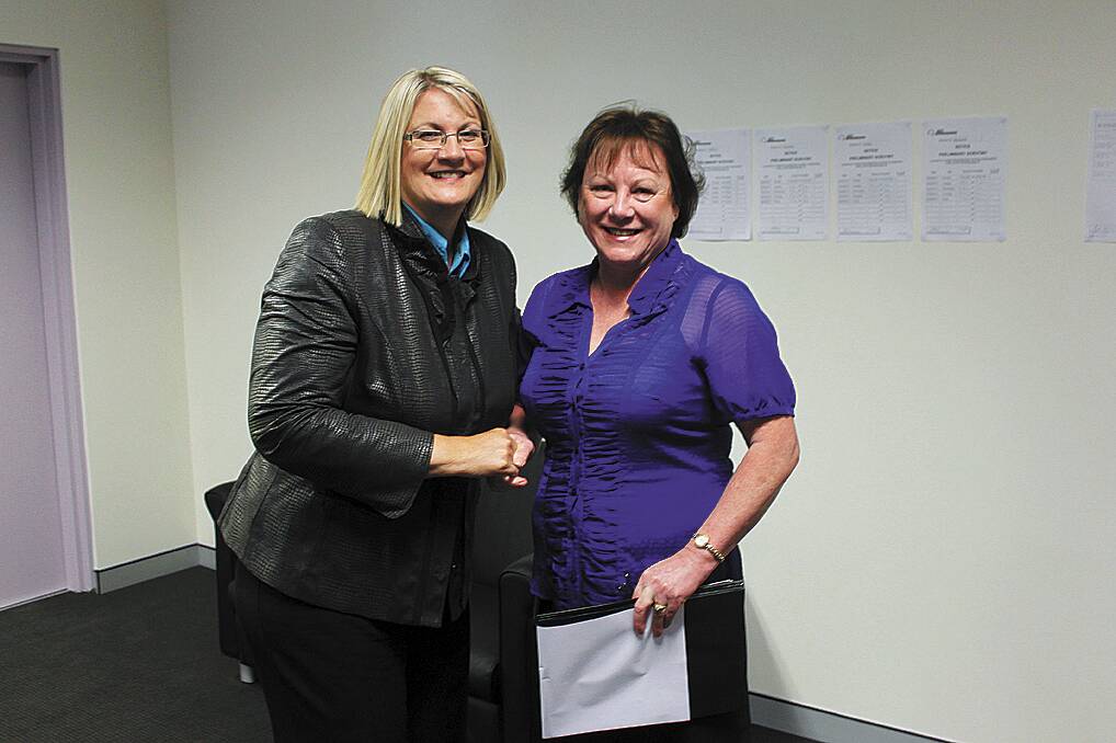 Macquarie MP Louise Markus with divisional returning officer at the Australian Electoral Commission, Debbie Bush, following the announcement.
