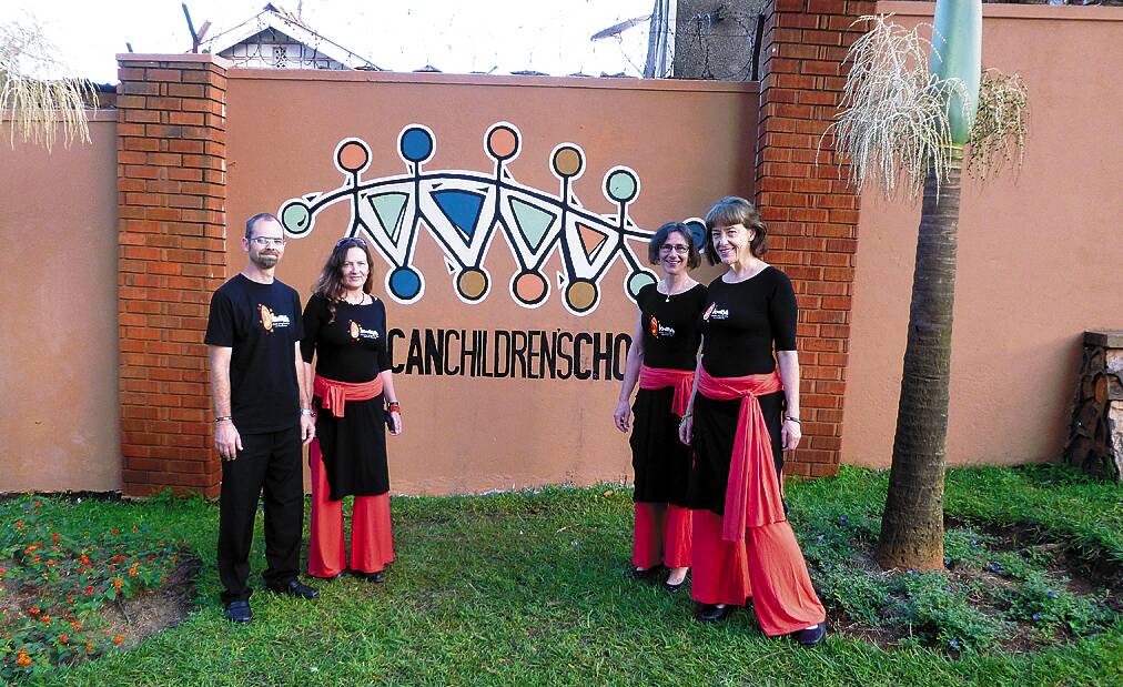 Brendan O'Reilly, Elaine Cameron, Lizzy Oakes and Kate Swadling at the African Children's Choir Training Academy in Kampala.