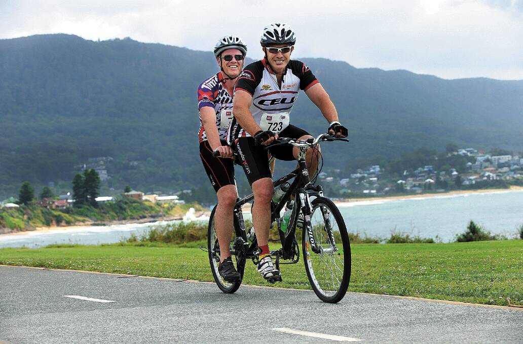 Charles Hardimon (front) and Stephen Hare on a charity ride from Sydney to Wollongong in November last year.