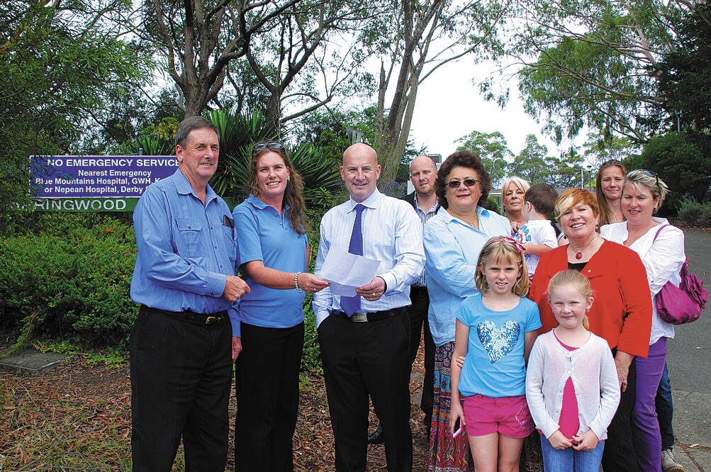 From left, Friends of Springwood Hospital spokesman Richard Jackson-Hope with Blue Mountains Labor spokesperson Trish Doyle, Opposition Leader John Robertson, Union spokesperson Mary Court and  Labor MLC and duty spokesperson for Blue Mountains Helen Westwood with residents outside the hospital.
