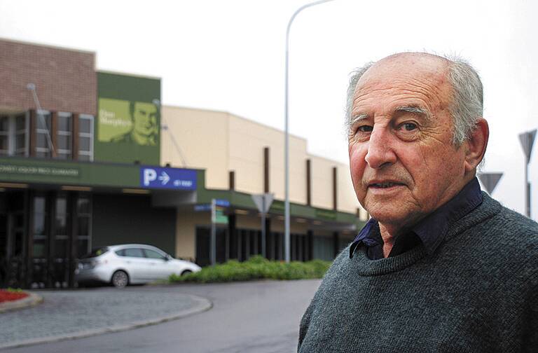 Clr Don McGregor is worried about extreme alcohol abuse by young people in the Mountains. He is pictured outside one of Katoomba's newest liquor outlets.