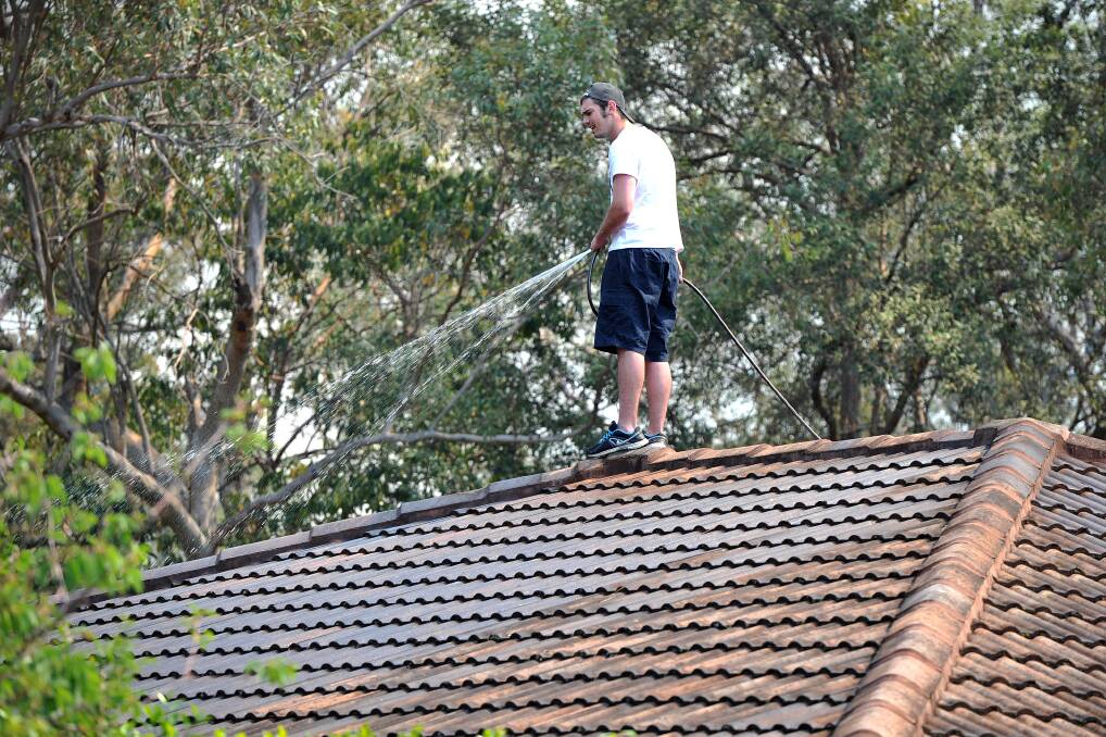 Single Ridge Rd Winmalee, residents are on alert for falling embers. Picture: Kylie Pitt .