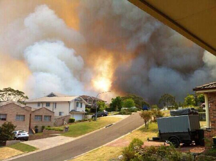 Fire approaching homes