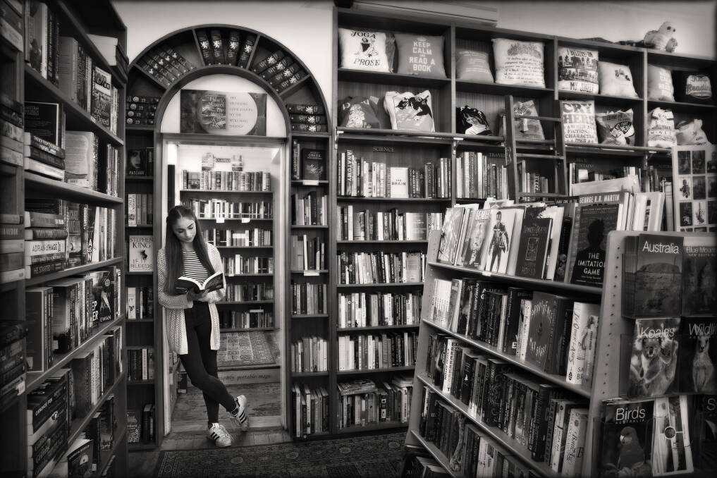 Tracy Ponich's photo Eleni and the Bookshop, which caught the eye of judges in the 2021 National Photographic Portrait Prize. 