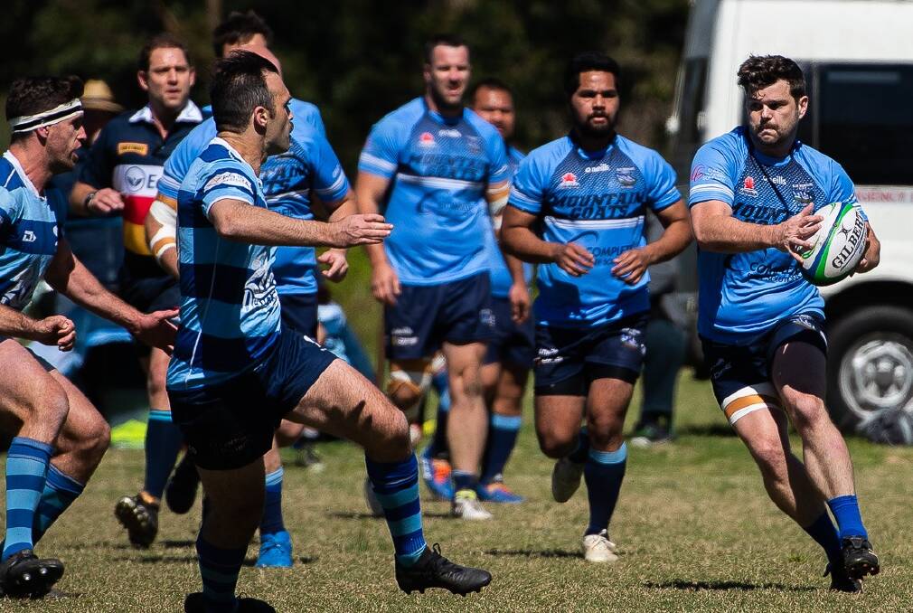 Blue bloods: New Blue Mountains Rugby first grade assistant coach Luke Raams (with ball) in action against Mosman in the fourth grade grand final in 2020. 