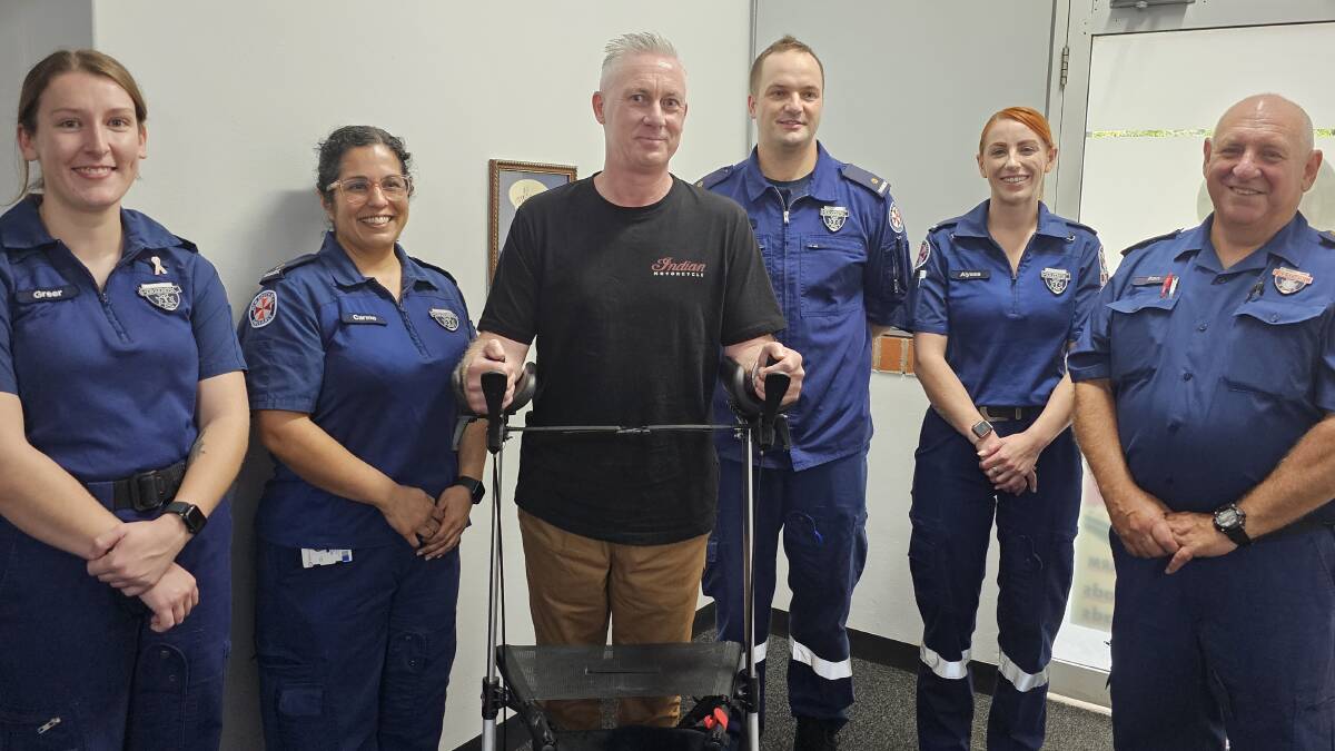 Mark Bonfield with Mr Gavin (far right) and the team of Paramedics that saved his life. Picture by Reidun Berntsen. 