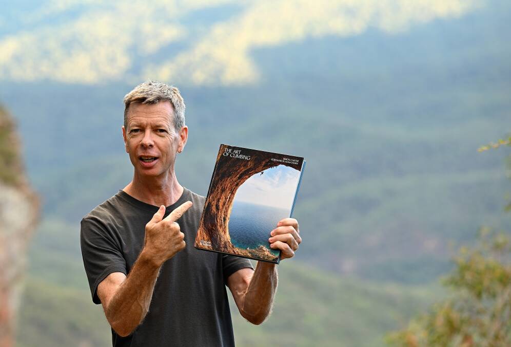 Simon Carter with his new book, The Art of Climbing. Picture supplied