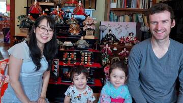 Ayaka Thompson (left) with her husband Andrew (right) and their two children, Sakura and Seiya. Picture supplied