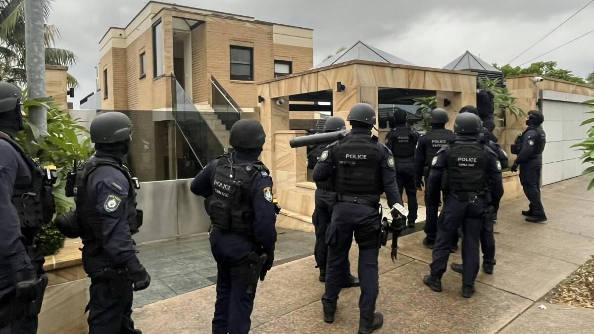 Multi-squad operation locks down the neighbourhood of an alleged member of an organised criminal network during two compliance checks. Picture supplied