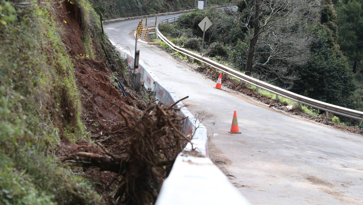 The Two Mile section of Jenolan Caves Road (pictured during roadworks last year) has been cut off since early July due to a landslip. Picture: Transport For NSW