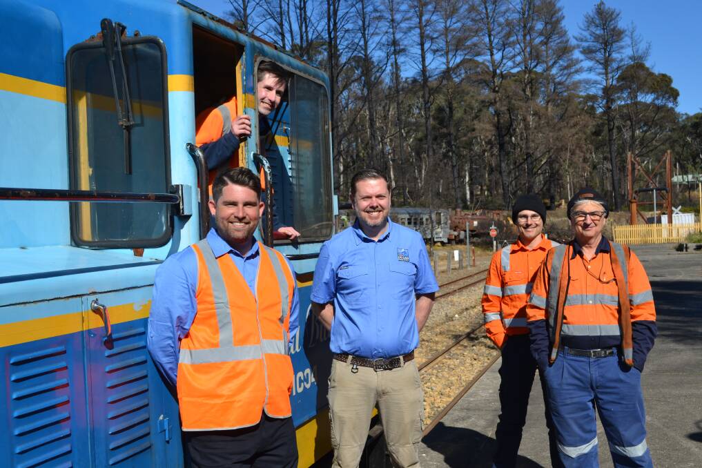 HAPPY DAYS: Volunteers and workers were all smiles as the first locomotive pulls up to Clarence Station in eight years. Picture: CIARA BASTOW