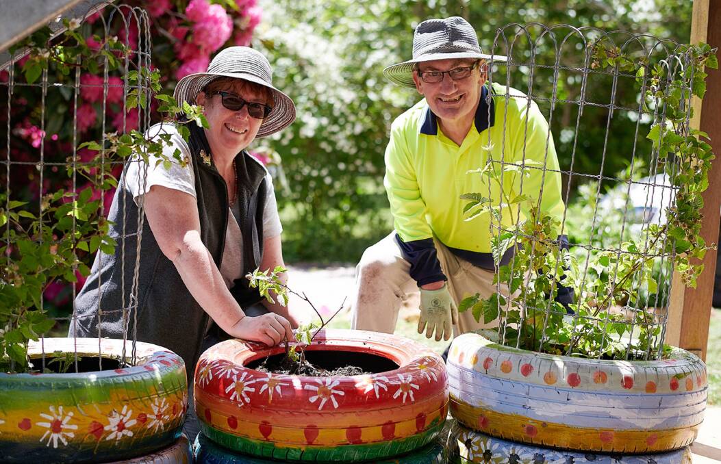INDEPENDENT LIVING: Trish and Bruce hard at work in the Coo-ee Garden at Blackheath.