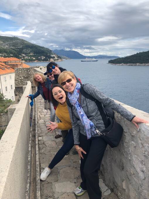 LEADING THE WAY: Travel expert Dianne with a tour group in Dubrovnik.