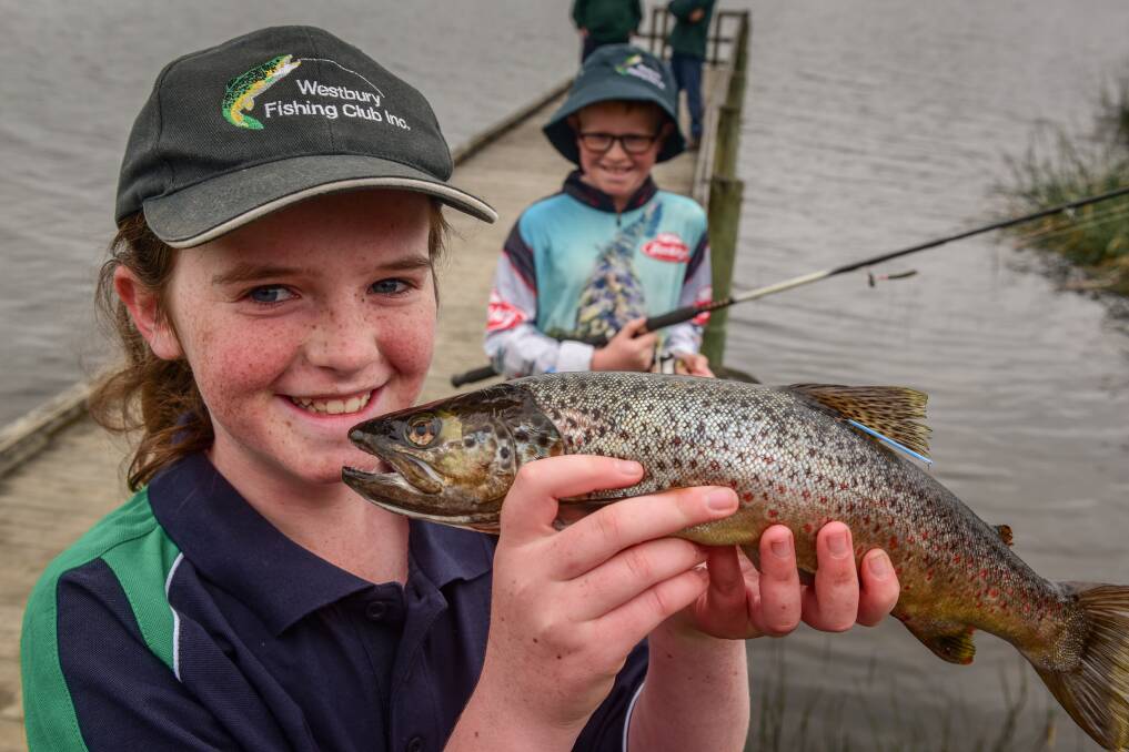 HOOKED: Fiona Batterham was fishing with her family when she caught the first of five $10,000 trout. Photo: Paul Scambler
