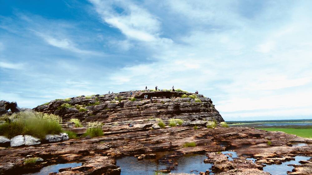 BIG SKY, BIG VIEWS –  The rocky lookout at Ubirr offers super views over the floodplains.