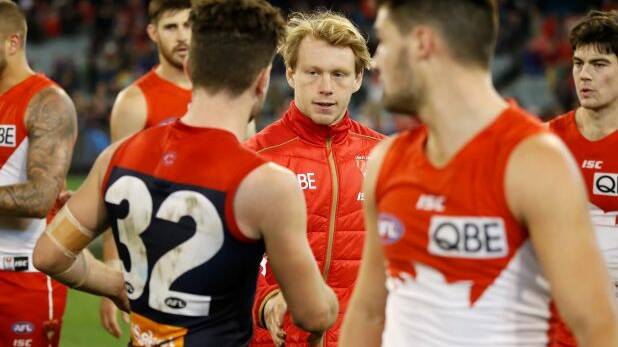 Low act: The father of Callum Mills says it was unfair Tomas Bugg was allowed to play on after his hit on his son.  Photo: AFL Media/Getty Images