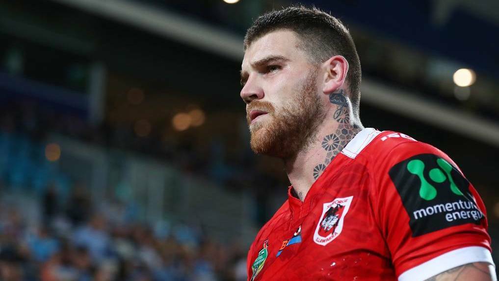 Big worry: Dragons fullback Josh Dugan leaves the field injured in their loss to the Gold Coast. Picture: Getty Images