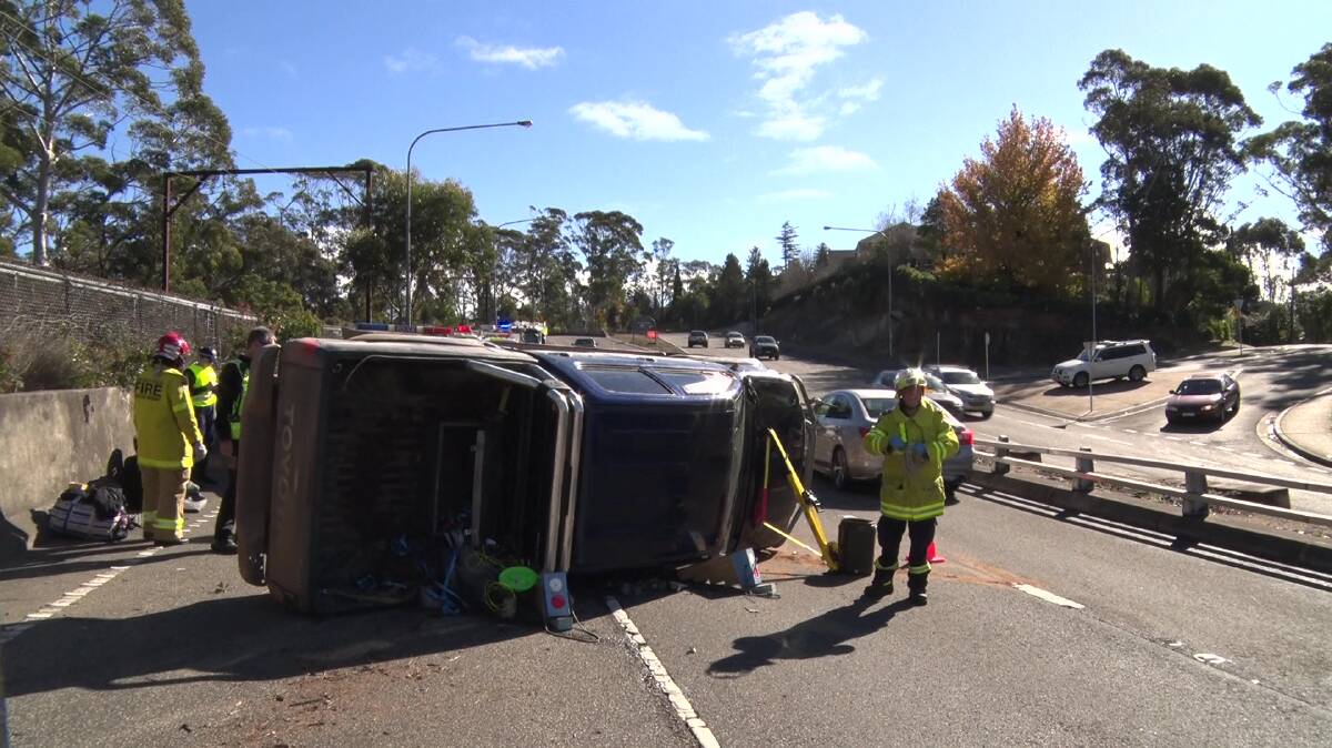 A car rolled over on the Great Western Highway near Leura on Monday morning. Pictures: Top Notch Video