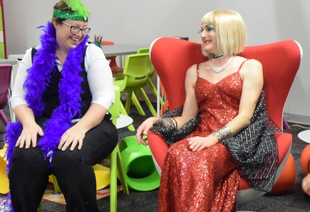 COLOURFUL: Children's librarian Kellie Drengenberg and Blue Mountains drag queen Martina Concepta. Photo: Phoebe Moloney. 